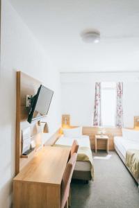 Voodi või voodid majutusasutuse Hotel Andres toas