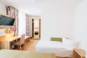 Voodi või voodid majutusasutuse Hotel Andres toas