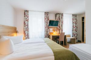 Voodi või voodid majutusasutuse Hotel Andres toas
