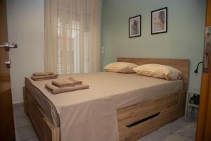 Posteľ alebo postele v izbe v ubytovaní Fobillo Apartment at Charilaou