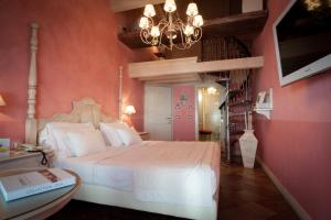 Кровать или кровати в номере Olivi Hotel & Natural Spa