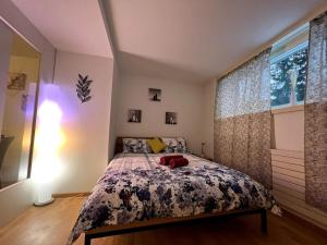 a bedroom with a bed and a window at Lovely 2 Bedrooms Apartment in Davos Platz, Davos in Davos