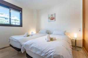 Posteľ alebo postele v izbe v ubytovaní CT 215 - Cala Blanca - Mijas Costa