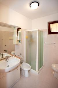 Et badeværelse på Appartamento Casa Ledio - Rebomaholidays