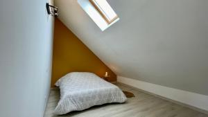 Posteľ alebo postele v izbe v ubytovaní Jolie maison à 2 pas de la forêt du Touquet