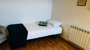 Postel nebo postele na pokoji v ubytování Casa Simona