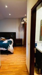 Postel nebo postele na pokoji v ubytování Casa Simona