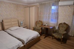 Кровать или кровати в номере Hotel Konka