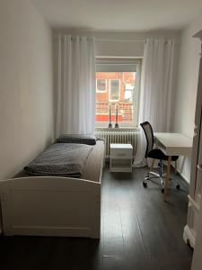 Postel nebo postele na pokoji v ubytování Quartier Lookvenne Wohnung 1