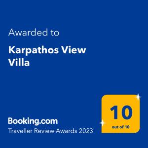a yellow sign with the text awarded to karathos view villa at Karpathos View Villa in Karpathos