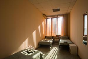Ліжко або ліжка в номері Si-Yo hostel