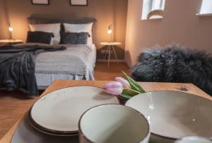 Postel nebo postele na pokoji v ubytování St. Salvator Apartments