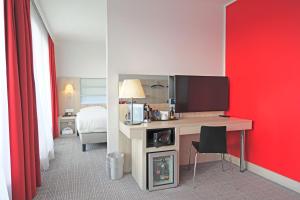 TV i/ili multimedijalni sistem u objektu Park Inn by Radisson Linz