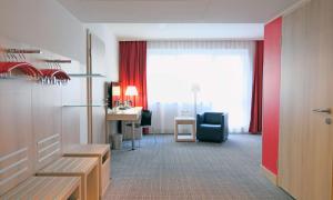 Krevet ili kreveti u jedinici u okviru objekta Park Inn by Radisson Linz
