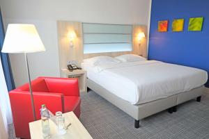 Krevet ili kreveti u jedinici u okviru objekta Park Inn by Radisson Linz