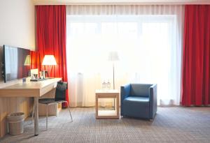 TV i/ili multimedijalni sistem u objektu Park Inn by Radisson Linz