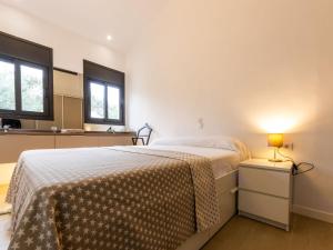 Posteľ alebo postele v izbe v ubytovaní Holiday Home Gunella by Interhome