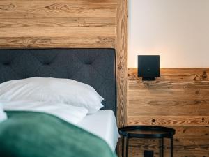 Posteľ alebo postele v izbe v ubytovaní Chalet Mountain Lodge - Klippitztörl by Interhome