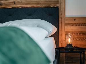 Posteľ alebo postele v izbe v ubytovaní Chalet Mountain Lodge - Klippitztörl by Interhome