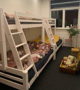 Postel nebo postele na pokoji v ubytování Børnenes