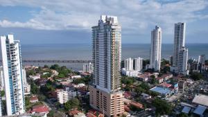 an aerial view of a city with tall buildings at Boutique Apartments Panamá Coco del Mar in Panama City