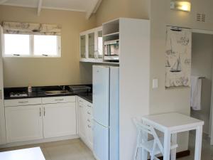 Η κουζίνα ή μικρή κουζίνα στο Beau Rivage Studio 112