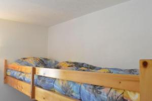 Posteľ alebo postele v izbe v ubytovaní Charmant appartement à deux pas de la plage