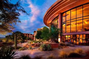 a large building with a lot of windows at Sheraton Grand at Wild Horse Pass in Chandler
