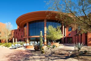 a building with a cactus in front of it at Sheraton Grand at Wild Horse Pass in Chandler