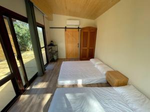 Postel nebo postele na pokoji v ubytování Tuscany Garden B&B