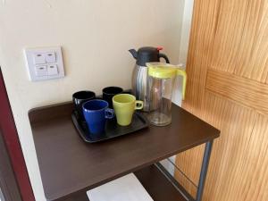 Příslušenství pro přípravu čaje a kávy v ubytování Tuscany Garden B&B