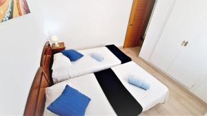 Postel nebo postele na pokoji v ubytování Apartamentos Navarra 08 Familidays