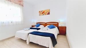 Postel nebo postele na pokoji v ubytování Apartamentos Navarra 08 Familidays + 28 fotografií