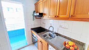 Kuchyň nebo kuchyňský kout v ubytování Apartamentos Navarra 08 Familidays