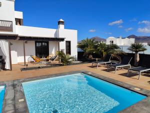 The swimming pool at or close to Casa del Sol Naciente - heated pools - wifi - UK,BE,NL,FR TV channels