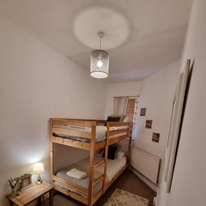 Ένα ή περισσότερα κρεβάτια σε δωμάτιο στο Inverness City Centre Flat