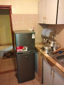 Η κουζίνα ή μικρή κουζίνα στο 1 bedroom TRM drive Roysambu Thika road