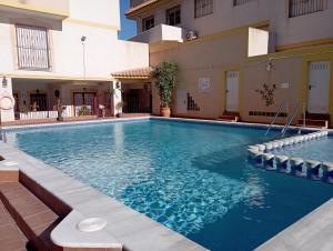 basen w środku budynku w obiekcie Apartment in La Zenia w mieście Orihuela Costa
