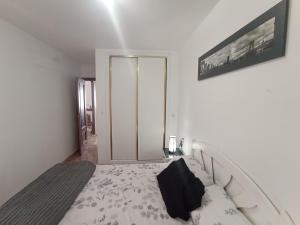 Łóżko lub łóżka w pokoju w obiekcie Apartment in La Zenia