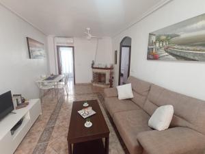 Telewizja i/lub zestaw kina domowego w obiekcie Apartment in La Zenia