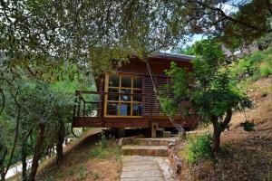 Zahrada ubytování Vacances en Chalet ou Mobil-home chez Camp'in Pirellu
