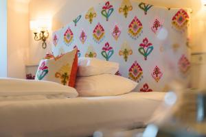 Łóżko lub łóżka w pokoju w obiekcie Hotel Gasthof Brandstätter
