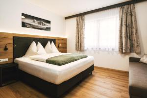 Posteľ alebo postele v izbe v ubytovaní Camping Dreiländereck Blockhütten & Apartments