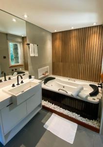 Vannituba majutusasutuses Pousada O Cantinho da Raposa