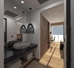 Postel nebo postele na pokoji v ubytování Aggello Boutique Hotel