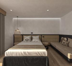 Postel nebo postele na pokoji v ubytování Aggello Boutique Hotel