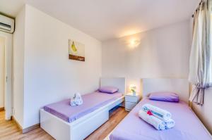 Posteľ alebo postele v izbe v ubytovaní Ideal Property Mallorca - Villa Jardi