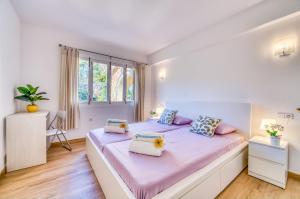 Posteľ alebo postele v izbe v ubytovaní Ideal Property Mallorca - Villa Jardi