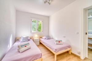 Posteľ alebo postele v izbe v ubytovaní Ideal Property Mallorca - Villa Jardi