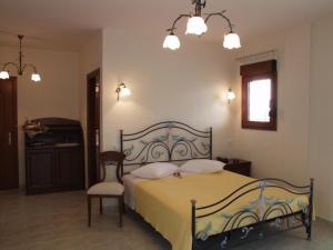 Ліжко або ліжка в номері Hotel Archontiko Dimitra